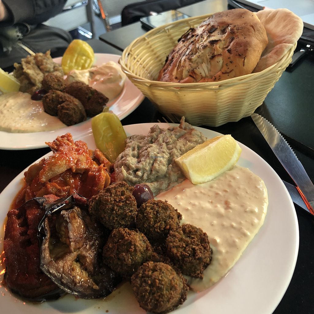 Chez Marianne signature dishes Assortiment de Mezzes (Assortment of Small Plates)FalafelHummusShawarma Plate